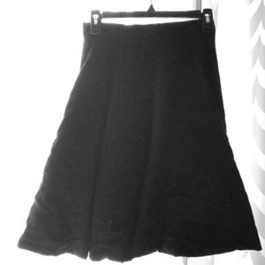 Slightly flared black skirt